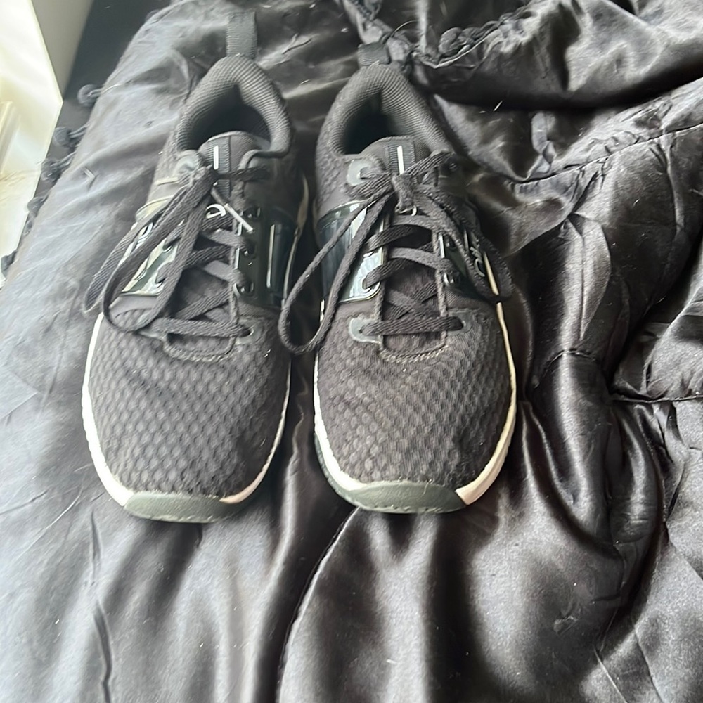 Nike tennis shoes they have been worn a couple of time. They are in great shape.